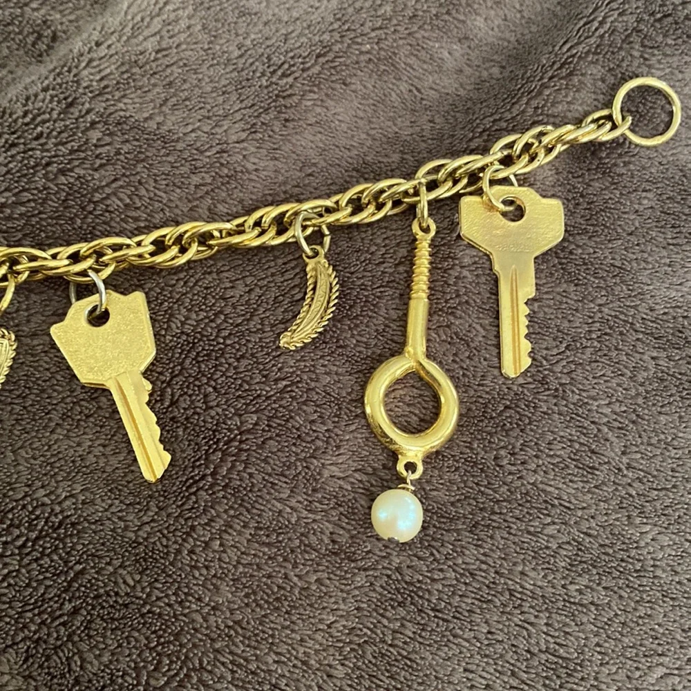 Vintage 1980s Rare Moschino Redwall 15 iconic brand gold charm necklace